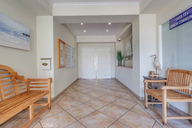 3120 Sepulveda Blvd Unit 312, Torrance, CA 90505 - entryway featuring ornamental molding, baseboards, light tile patterned flooring, and recessed lighting