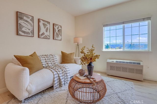 3120 Sepulveda Blvd Unit 312, Torrance, CA 90505 - sitting room featuring radiator heating unit, baseboards, and wood finished floors