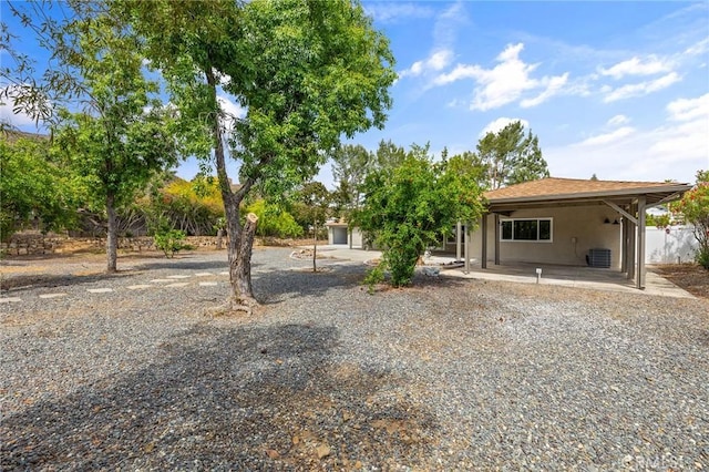 27130 Blue Hill Dr, Menifee, CA 92586 - rear view of house with stucco siding, a patio, and central air condition unit