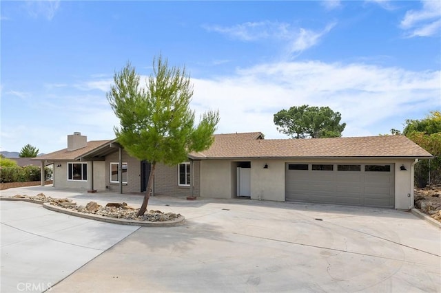 27130 Blue Hill Dr, Menifee, CA 92586 - ranch-style home with concrete driveway, a garage, stucco siding, and a chimney