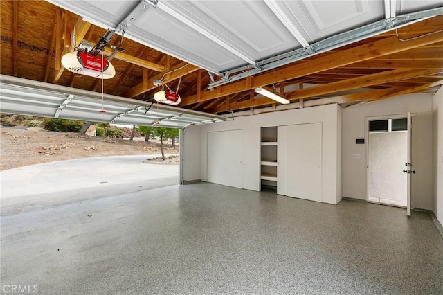 27130 Blue Hill Dr, Menifee, CA 92586 - garage featuring a garage door opener