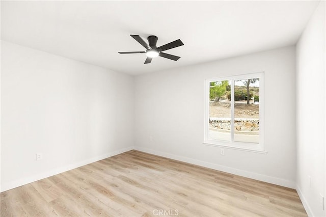 27130 Blue Hill Dr, Menifee, CA 92586 - unfurnished room with light wood-style flooring, a ceiling fan, and baseboards