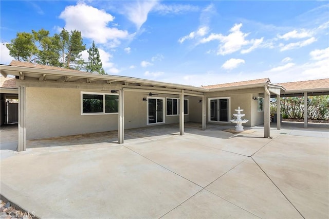 27130 Blue Hill Dr, Menifee, CA 92586 - rear view of house featuring stucco siding, a patio area, and ceiling fan