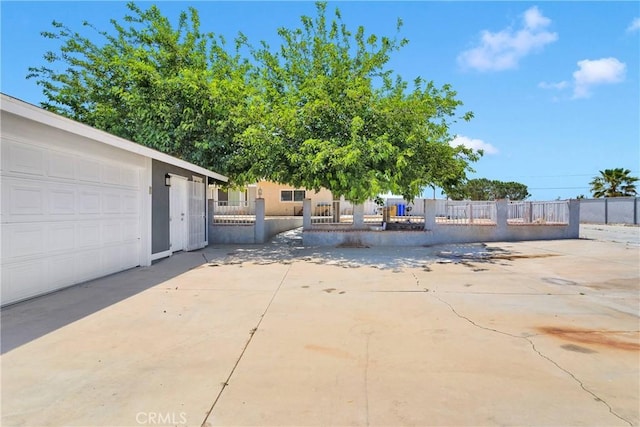 11941 9th Ave, Hesperia, CA 92345 - exterior space with a garage