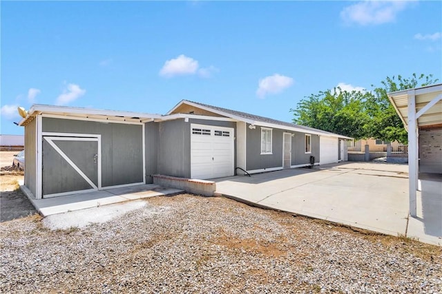11941 9th Ave, Hesperia, CA 92345 - back of house featuring an attached garage