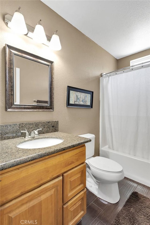 11941 9th Ave, Hesperia, CA 92345 - bathroom with vanity, toilet, shower / tub combo, and wood tiled floors