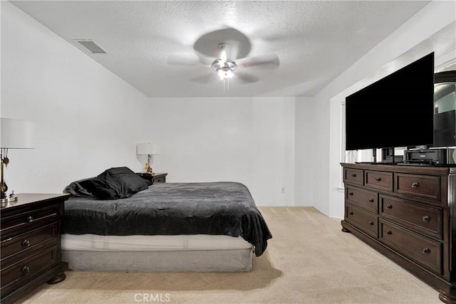 11941 9th Ave, Hesperia, CA 92345 - bedroom featuring light colored carpet and a ceiling fan