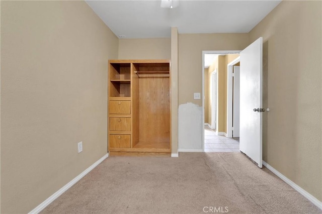 11941 9th Ave, Hesperia, CA 92345 - unfurnished bedroom with carpet floors, baseboards, and a closet