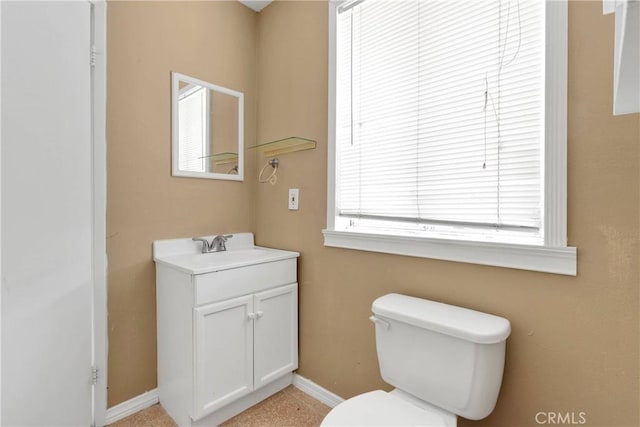 11941 9th Ave, Hesperia, CA 92345 - half bathroom with vanity, toilet, and baseboards