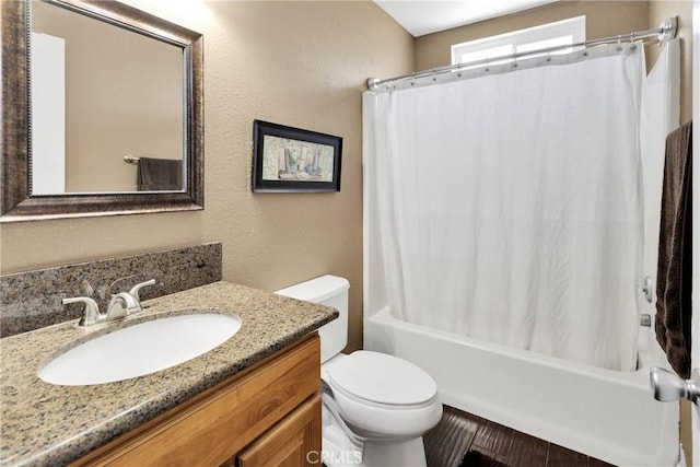 11941 9th Ave, Hesperia, CA 92345 - full bath featuring toilet, vanity, shower / bathtub combination with curtain, and a textured wall