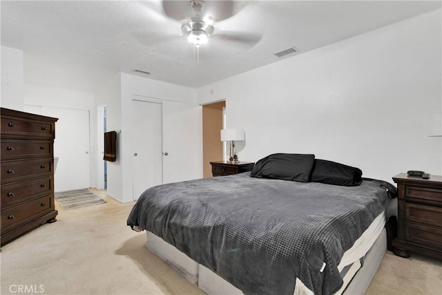 11941 9th Ave, Hesperia, CA 92345 - bedroom with light carpet, a closet, and ceiling fan