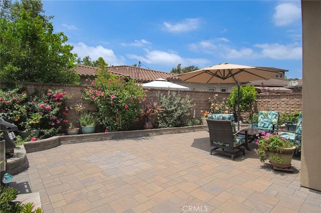 67 Galan St, Rancho Mission Viejo, CA 92694 - fenced backyard featuring a patio and an outdoor living space