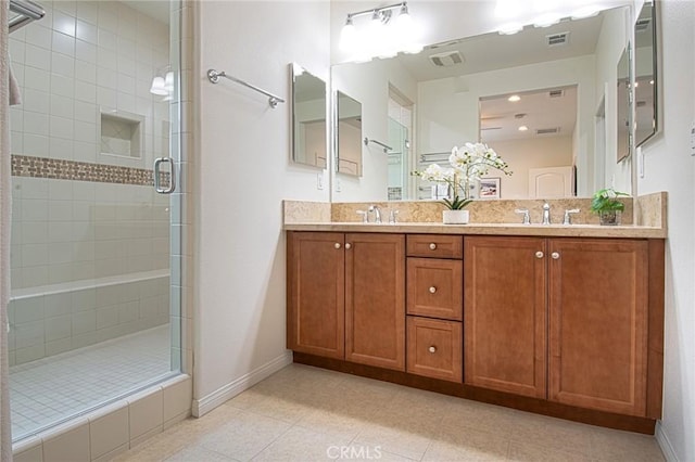 67 Galan St, Rancho Mission Viejo, CA 92694 - bathroom with a stall shower, double vanity, baseboards, and tile patterned floors