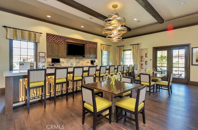 67 Galan St, Rancho Mission Viejo, CA 92694 - dining area featuring beamed ceiling, dark wood-style flooring, recessed lighting, and baseboards