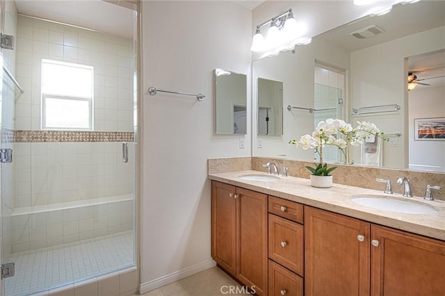 67 Galan St, Rancho Mission Viejo, CA 92694 - bathroom featuring double vanity, a ceiling fan, a stall shower, and tile patterned flooring