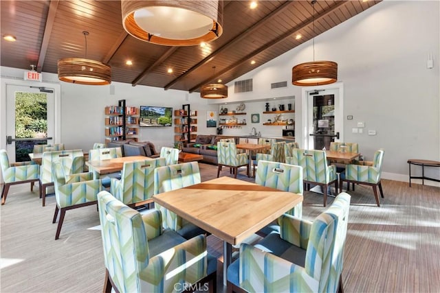 67 Galan St, Rancho Mission Viejo, CA 92694 - dining room with wooden ceiling with exposed beams, light carpet, high vaulted ceiling, and baseboards