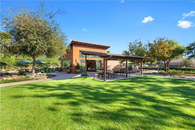 67 Galan St, Rancho Mission Viejo, CA 92694 - view of community featuring a yard and a patio area