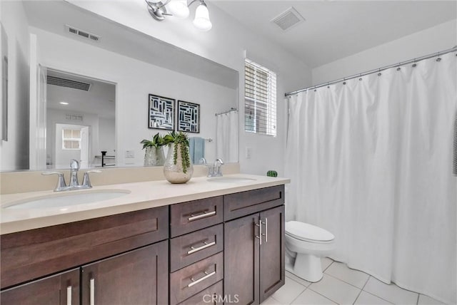 719 Huron Pl, Claremont, CA 91711 - bathroom with tile patterned flooring, double vanity, and a shower with curtain