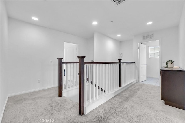 719 Huron Pl, Claremont, CA 91711 - hallway with an upstairs landing, carpet, and recessed lighting