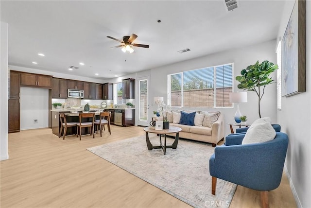 719 Huron Pl, Claremont, CA 91711 - living area featuring light wood-style floors, a ceiling fan, and recessed lighting