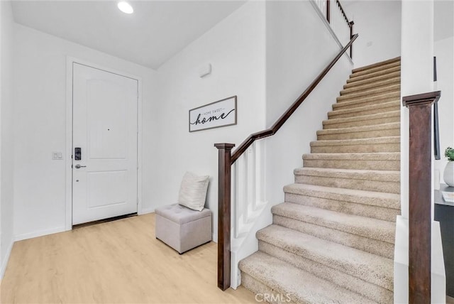719 Huron Pl, Claremont, CA 91711 - entryway with stairway, light wood-type flooring, and recessed lighting