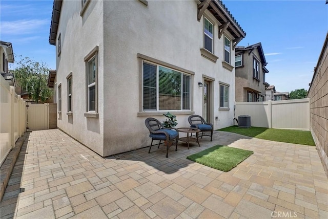 719 Huron Pl, Claremont, CA 91711 - rear view of property with stucco siding, a patio area, and a fenced backyard