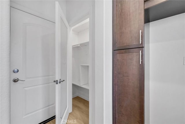 719 Huron Pl, Claremont, CA 91711 - spacious closet with light wood-style floors