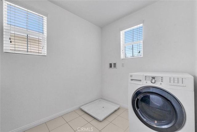 719 Huron Pl, Claremont, CA 91711 - washroom with washer / clothes dryer and light tile patterned flooring