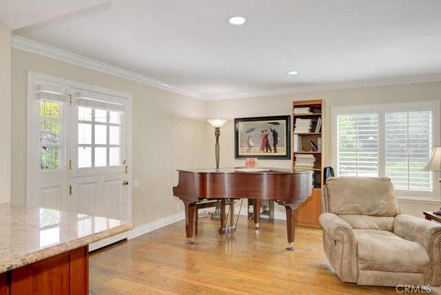2092 Ronda Granada Unit C, Laguna Woods, CA 92637 - living area featuring light wood-style flooring, crown molding, baseboards, and recessed lighting