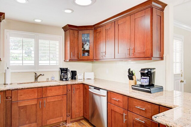 2092 Ronda Granada Unit C, Laguna Woods, CA 92637 - kitchen with dishwasher, a sink, light stone countertops, tasteful backsplash, and crown molding
