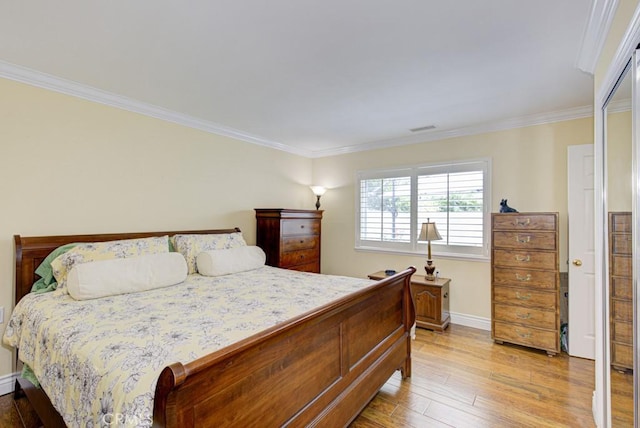 2092 Ronda Granada Unit C, Laguna Woods, CA 92637 - bedroom featuring light wood finished floors, ornamental molding, and baseboards