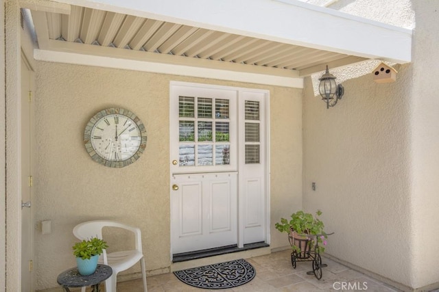 2092 Ronda Granada Unit C, Laguna Woods, CA 92637 - view of exterior entry with stucco siding