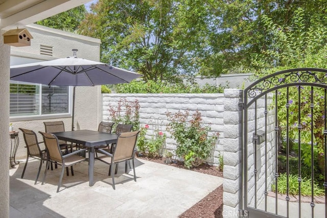 2092 Ronda Granada Unit C, Laguna Woods, CA 92637 - view of patio featuring outdoor dining area