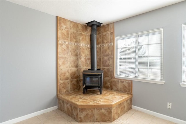 11314 Mariposa Rd, Hesperia, CA 92345 - detailed view of baseboards and a wood stove