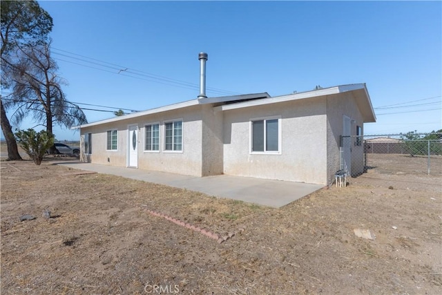 11314 Mariposa Rd, Hesperia, CA 92345 - rear view of house featuring stucco siding