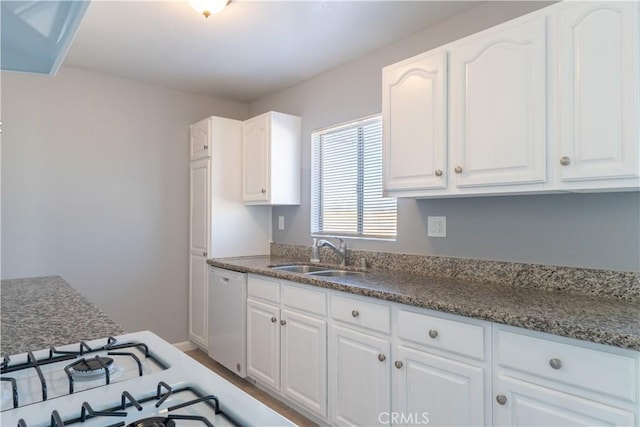 11314 Mariposa Rd, Hesperia, CA 92345 - kitchen with a sink, white dishwasher, white cabinetry, and baseboards