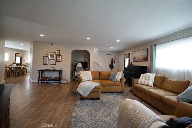 318 S Lucia Ave, Redondo Beach, CA 90277 - living area featuring wood finished floors, arched walkways, recessed lighting, and baseboards