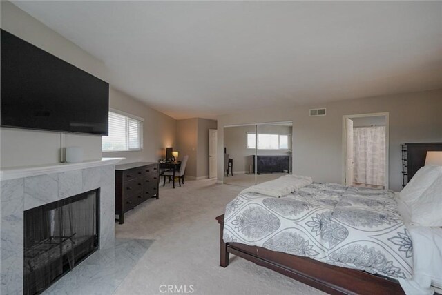 318 S Lucia Ave, Redondo Beach, CA 90277 - bedroom featuring a high end fireplace and light colored carpet