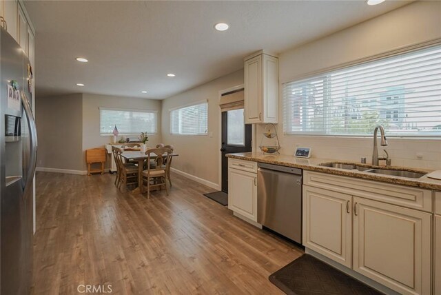 318 S Lucia Ave, Redondo Beach, CA 90277 - kitchen featuring appliances with stainless steel finishes, a sink, baseboards, light wood finished floors, and recessed lighting