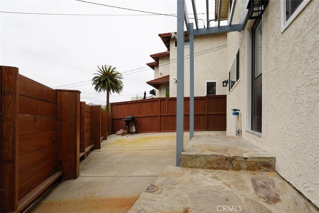 318 S Lucia Ave, Redondo Beach, CA 90277 - fenced backyard featuring a patio area and area for grilling