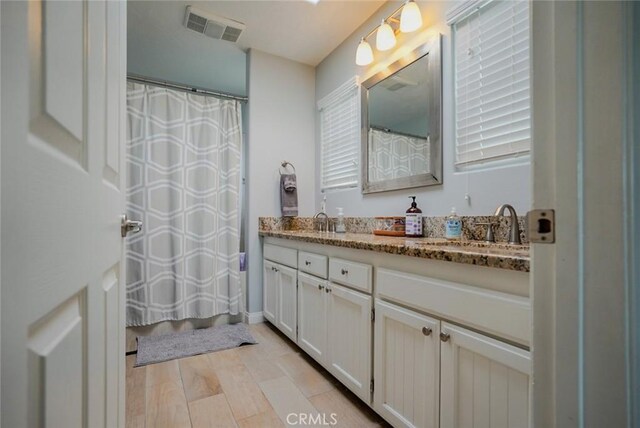 318 S Lucia Ave, Redondo Beach, CA 90277 - bathroom with vanity, wood finished floors, and a shower with shower curtain