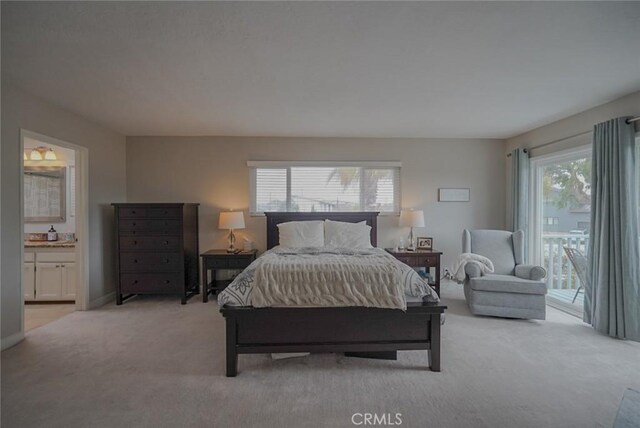318 S Lucia Ave, Redondo Beach, CA 90277 - bedroom featuring access to exterior, light colored carpet, and ensuite bathroom