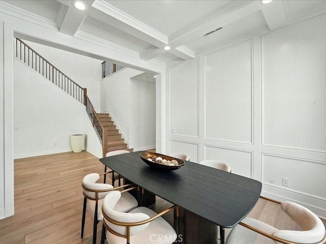 18814 Annmae Pl, Saugus, CA 91350 - dining room featuring coffered ceiling, beam ceiling, stairs, a decorative wall, and light wood-type flooring