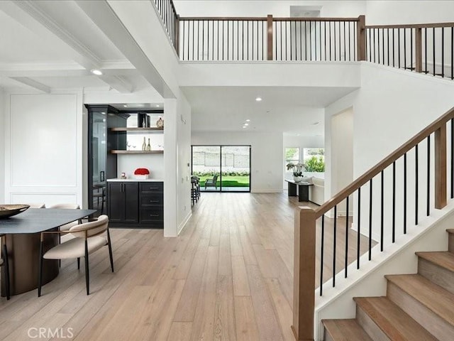 18814 Annmae Pl, Saugus, CA 91350 - entryway with stairs, light wood-type flooring, and a high ceiling