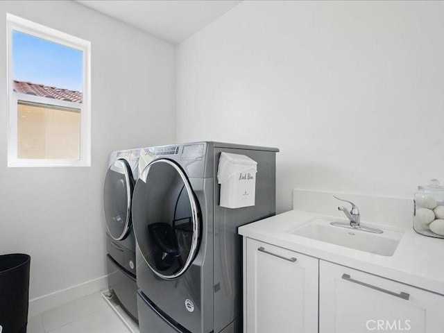 18814 Annmae Pl, Saugus, CA 91350 - washroom featuring independent washer and dryer and cabinet space