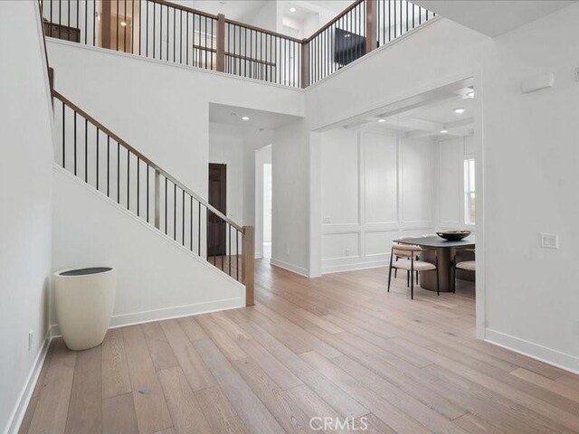 18814 Annmae Pl, Saugus, CA 91350 - entryway with wood finished floors, stairs, and a high ceiling