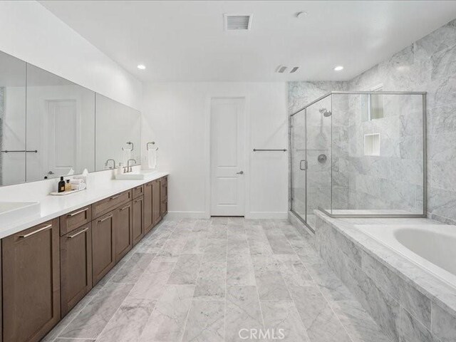 18814 Annmae Pl, Saugus, CA 91350 - bathroom with a bath, a stall shower, double vanity, and recessed lighting