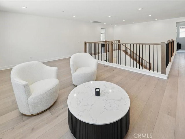18814 Annmae Pl, Saugus, CA 91350 - living area with light wood-type flooring, an upstairs landing, and recessed lighting