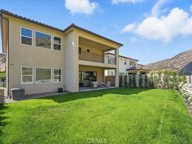 18814 Annmae Pl, Saugus, CA 91350 - rear view of house featuring a balcony, stucco siding, and a patio area