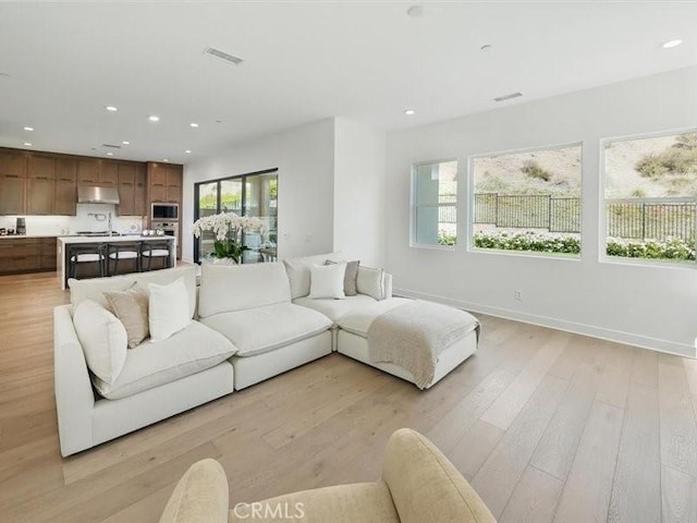 18814 Annmae Pl, Saugus, CA 91350 - living area with recessed lighting and light wood-style floors